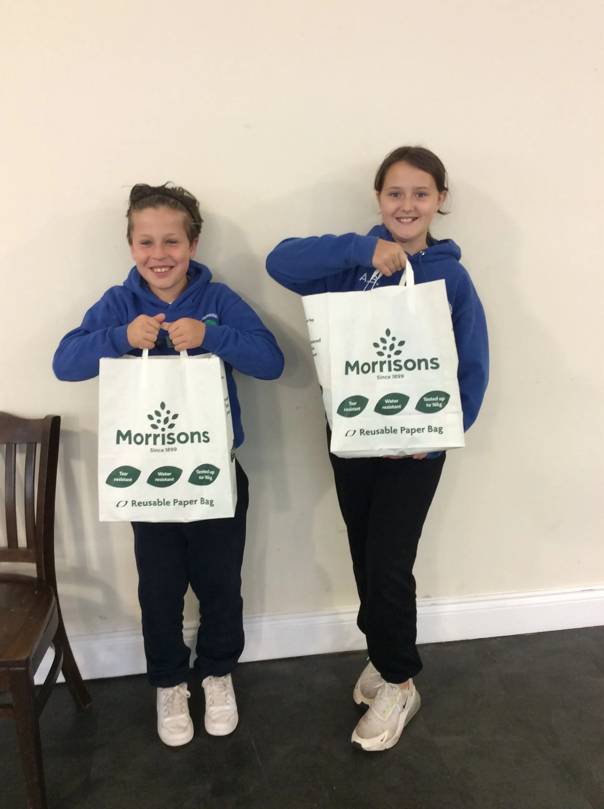 Ambassadors with the bags they made at the Foodbank